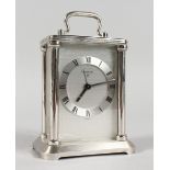 A LOOPING CHROME CARRIAGE CLOCK, with fifteen jewels, Swiss made, No. 1078574, with carrying handle.