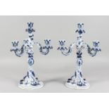 A LARGE PAIR OF MEISSEN PORCELAIN BLUE AND WHITE CANDELABRA, each with three scrolling branches.