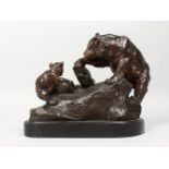 RUSSE A BRONZE GROUP, BEAR MOTHER AND CUB, on a rocky base. Signed. 11ins long.