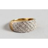 A 9CT GOLD AND DIAMOND WEDDING RING.