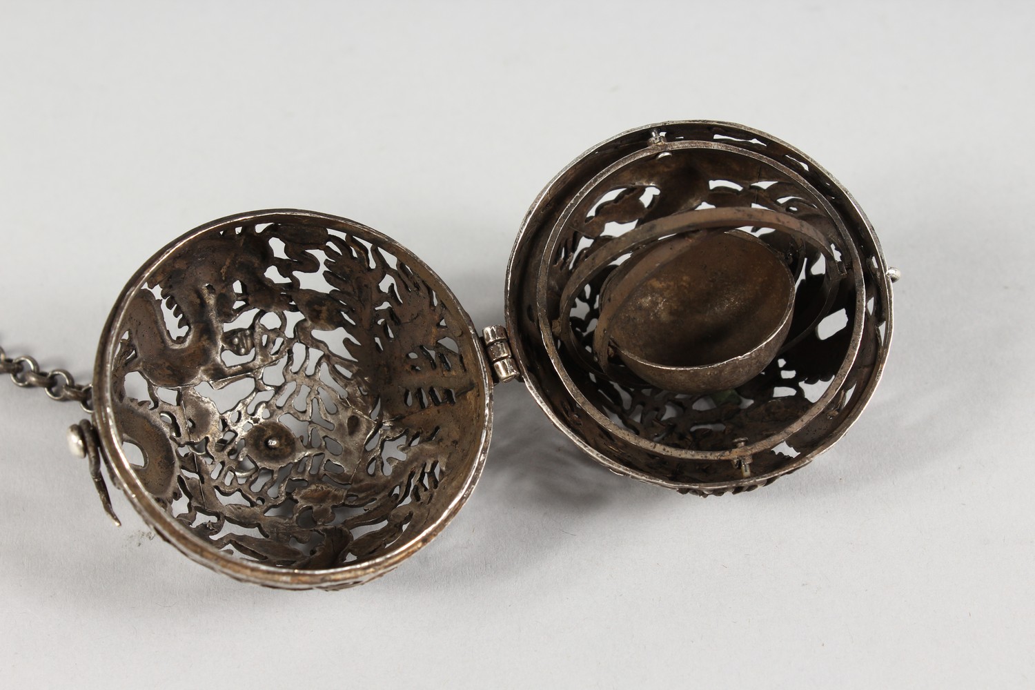 A CHINESE WHITE METAL PIERCED BALL CENSER. 2ins diameter. - Image 3 of 3