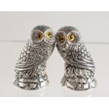 A PAIR OF CAST SILVER PLATED NOVELTY OWL SALT AND PEPPERS.