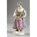 AN 18TH CENTURY MEISSEN PORCELAIN FIGURE OF A YOUNG GIRL carrying a basket of flowers (AF). 5ins