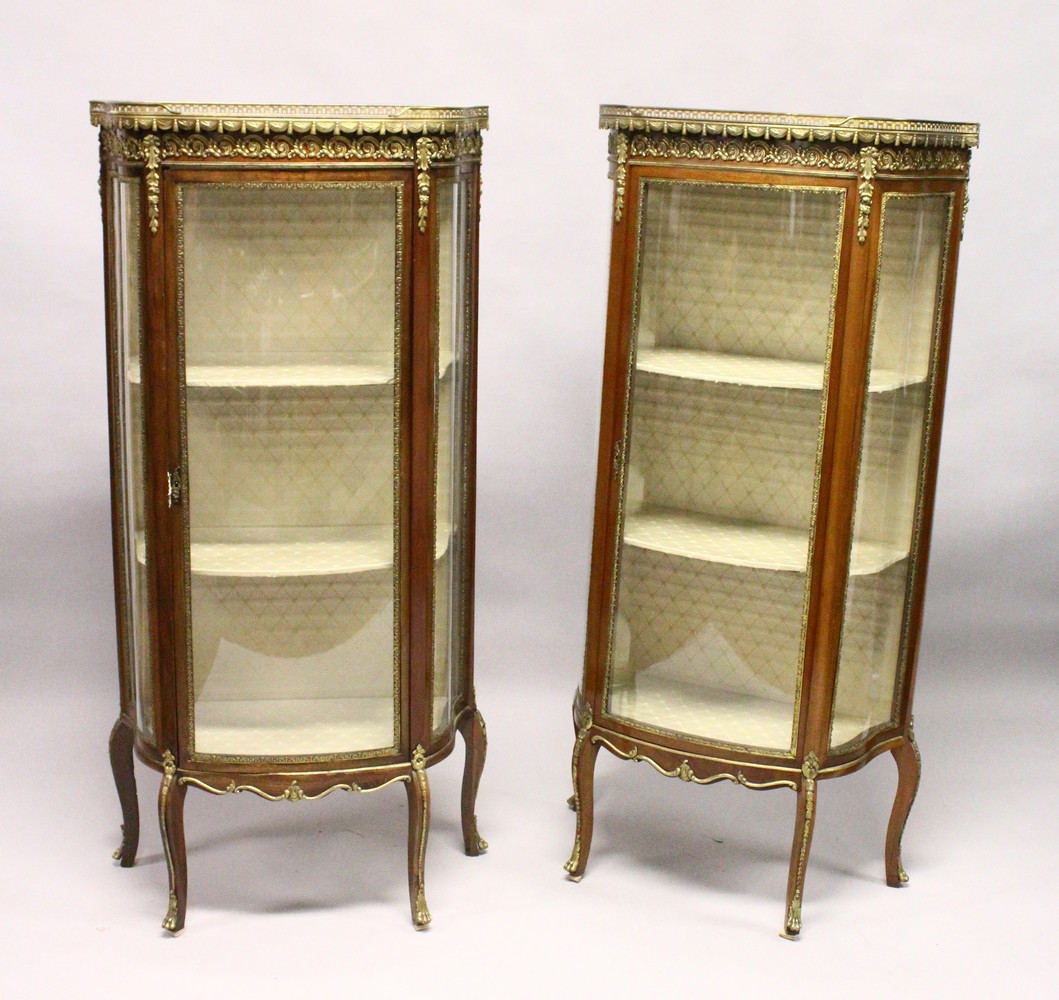 A PAIR OF FRENCH MAHOGANY, ORMOLU AND MARBLE BOWFRONT VITRINES, MID 20TH CENTURY, with galleried