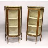 A PAIR OF FRENCH MAHOGANY, ORMOLU AND MARBLE BOWFRONT VITRINES, MID 20TH CENTURY, with galleried