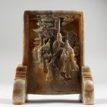 A SMALL CHINESE CARVED JADE TABLE SCREEN. 7.5ins high.