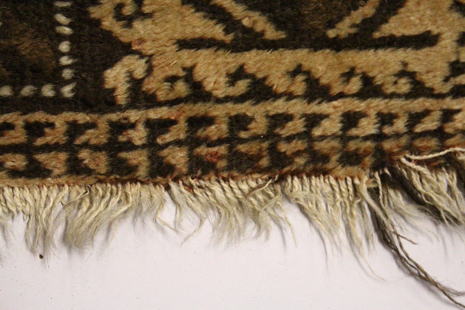 A PERSIAN AFGHAN RUG, EARLY 20TH CENTURY, beige ground with allover stylised designs. 4ft 5ins x 2ft - Image 4 of 7