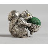 A SMALL NOVELTY SILVER SQUIRREL PIN CUSHION. 1ins.
