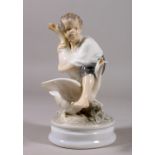 A COPENHAGEN PORCELAIN GROUP ON A YOUNG BOY WITH TWO GEESE. Pattern No. 2139. 7ins high.