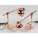 A PAIR OF SMALL COPPER ANGLEPOISE LAMPS.