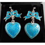A PAIR OF SILVER AND BLUE ENAMEL HEART AND BOW EARRINGS.