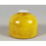 A CHINESE YELLOW GROUND PORCELAIN BRUSH POT. 3.25ins high.