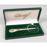 A DAVIDOFF SCISSOR ACTION CIGAR CUTTER, boxed.