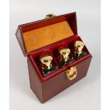 GUSTAVE KELLER, PARIS A TRAVELLING LEATHER VANITY CASE, with three cut glass scent bottles with