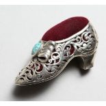 A NOVELTY SILVER PIERCED SHOE PIN CUSHION. 2ins long.