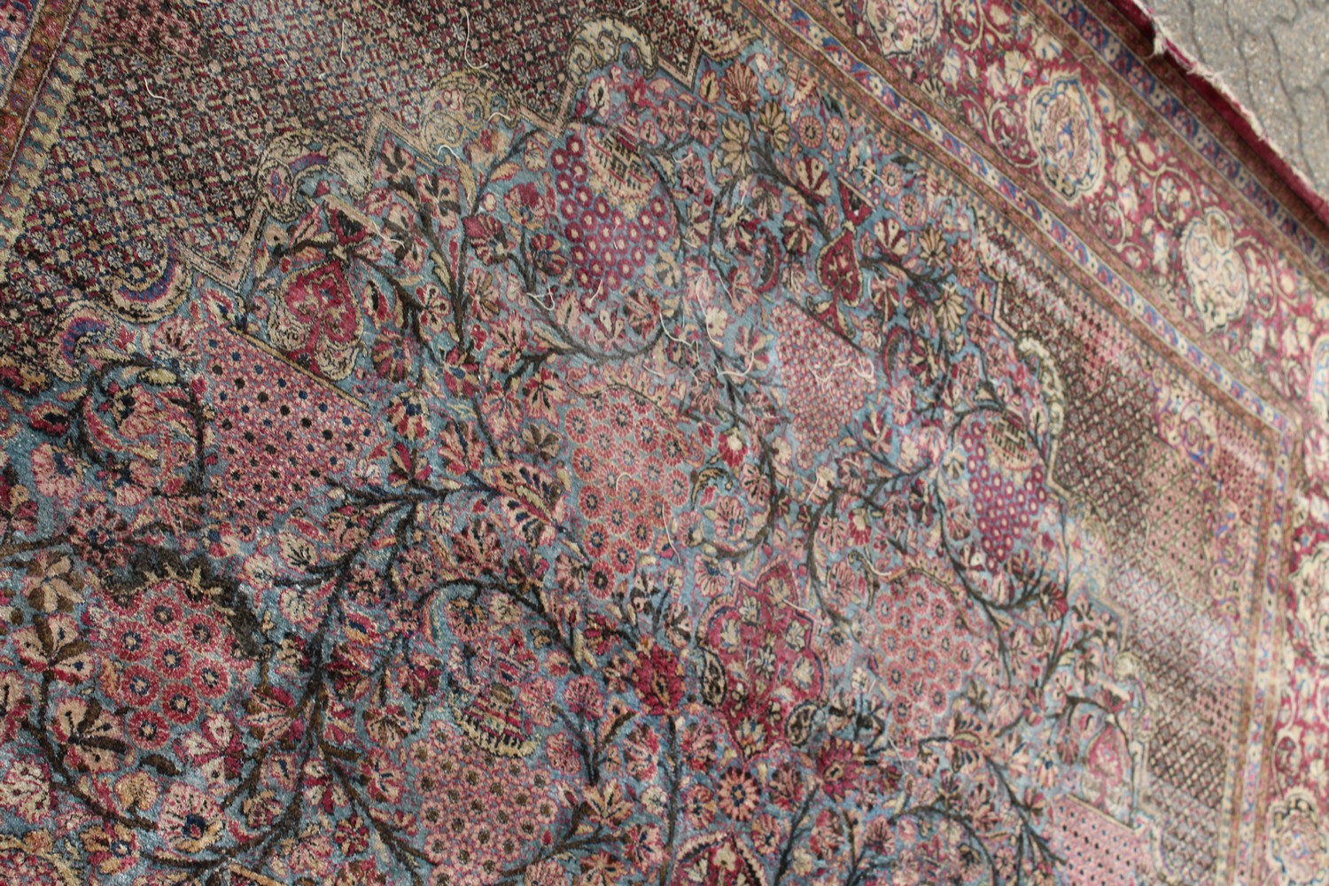 A 19TH/20TH CENTURY PERSIAN TEHRAN SILK CARPET, red ground with numerous vases of flowers, panels of - Image 9 of 15