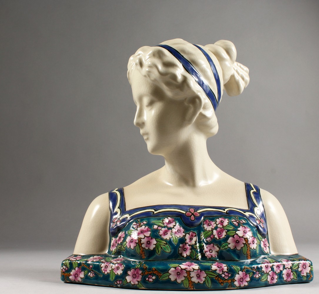 A FRENCH PORCELAIN BUST, head and shoulders of a lady. 11ins high.