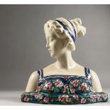 A FRENCH PORCELAIN BUST, head and shoulders of a lady. 11ins high.