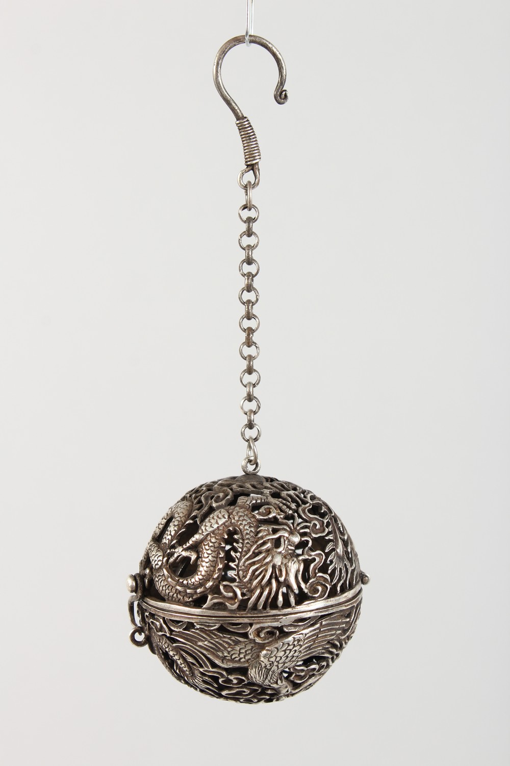 A CHINESE WHITE METAL PIERCED BALL CENSER. 2ins diameter. - Image 2 of 3