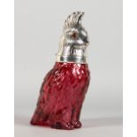 A CRANBERRY COLOUR GLASS AND PLATED PARROT FORM DECANTER. 10ins high.