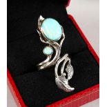 A SILVER AND REAL OPAL NATURALISTIC RING.