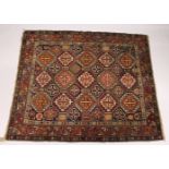 A GOOD, SMALL PERSIAN CAUCASIAN RUG, EARLY 20TH CENTURY, blue ground with allover stylised