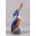 A COPENHAGEN PORCELAIN GROUP ON A KINGFISHER. Pattern No. 2257. 7ins high.