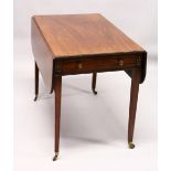 A GEORGE III MAHOGANY PEMBROKE TABLE, with a drawer to one end, ebony and brass inlaid decoration,