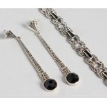 A SILVER MARCASITE ONYX SET BRACELET and PAIR OF DROP EARRINGS.