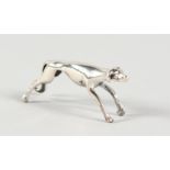 A MINIATURE SILVER GREYHOUND. 1.25ins long.