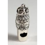 A SILVER OWL WHISTLE. 1.75ins long.