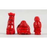 THREE CHINESE CARVED CORAL FIGURES. 1.5ins, 2ins and 2.25ins high.