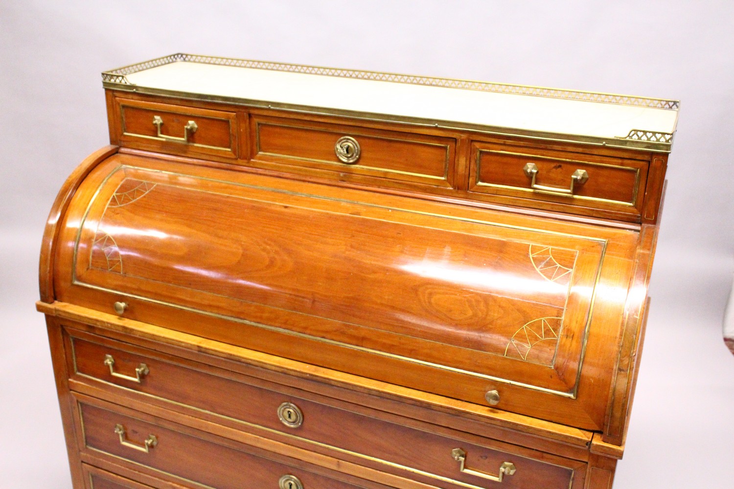 A 19TH CENTURY CONTINENTAL FRUITWOOD CYLINDER BUREAU, with brass galleried marble top, over three - Image 4 of 16