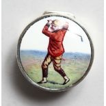 A SMALL SILVER CIRCULAR PILL BOX, the lid with an enamel of a golfer.