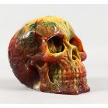 A RESIN SKULL. 5ins high.