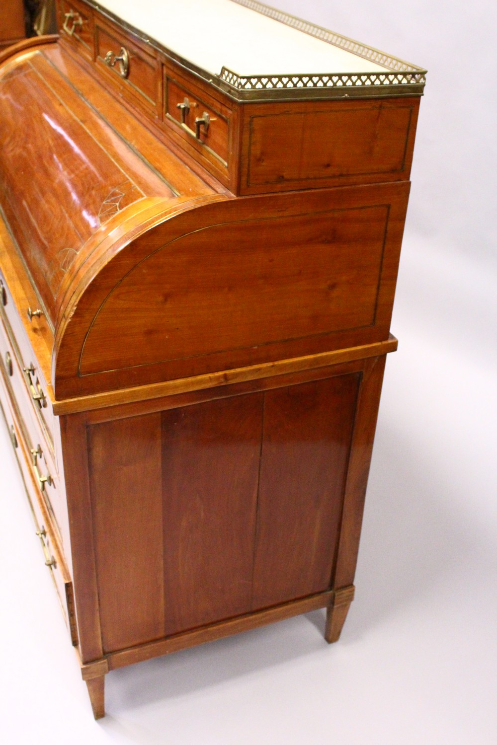 A 19TH CENTURY CONTINENTAL FRUITWOOD CYLINDER BUREAU, with brass galleried marble top, over three - Image 14 of 16