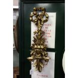 A pair of carved giltwood wall sconces