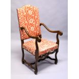 A beech framed open armchair with upholstered back and seat