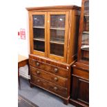 A mahogany and pine cabinet on chest