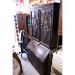 An oak bureau bookcase