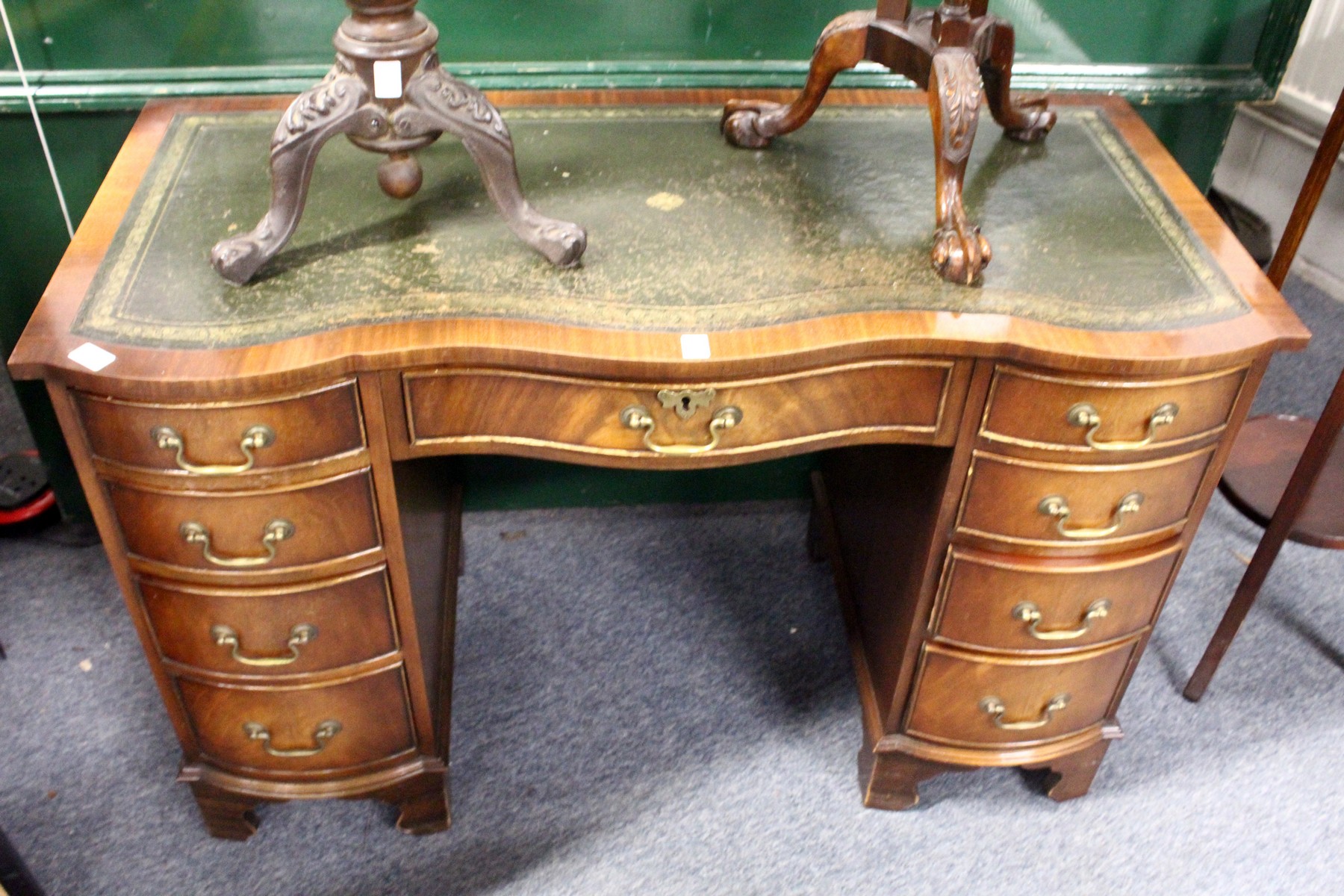 A mahogany pedestal desk