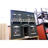 An old painted dolls house