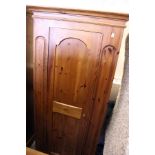 A Victorian style pine wardrobe