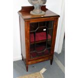An Edwardian inlaid rosewood music cabinet