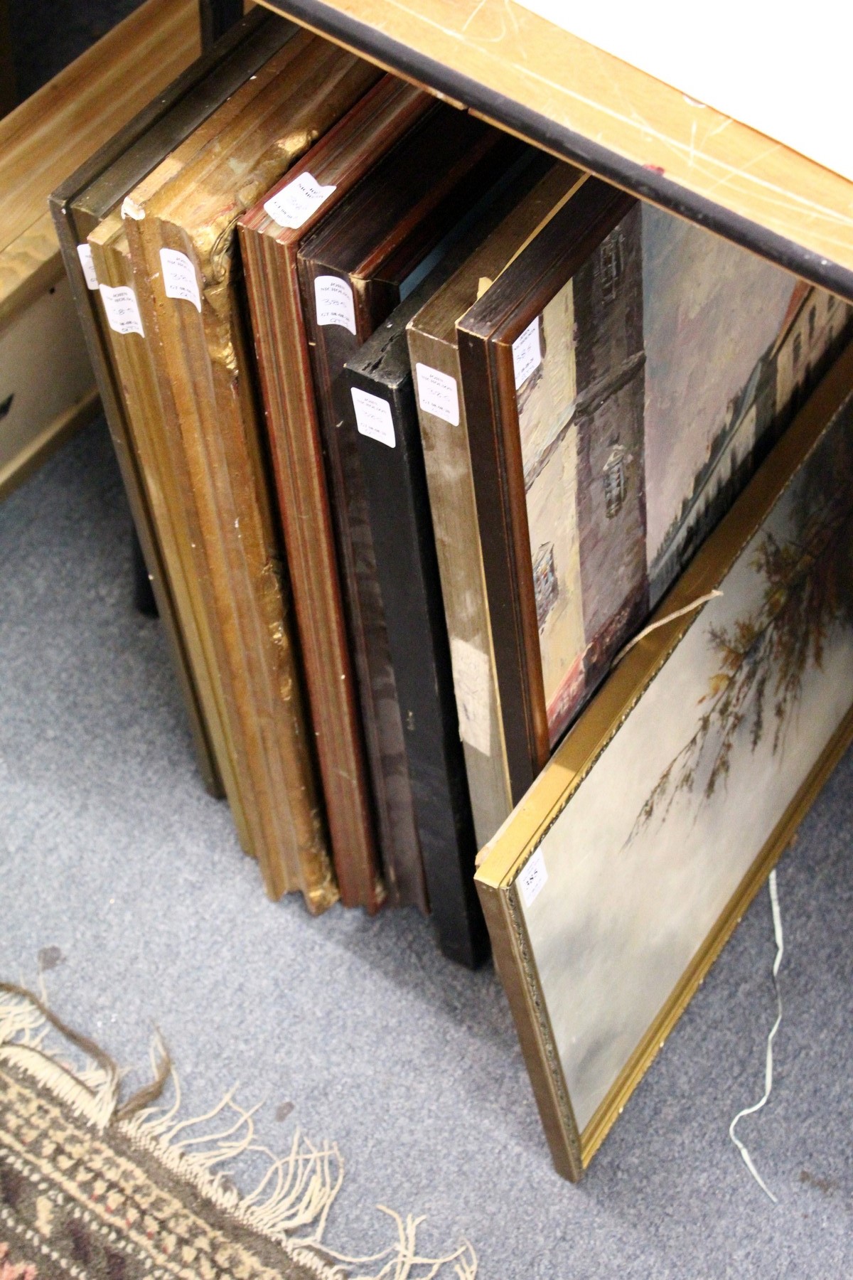 A quantity of paintings mostly oil on canvas