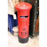 A novelty floor standing reproduction post box