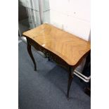 A French style mahogany serpentine fronted fold-over card table