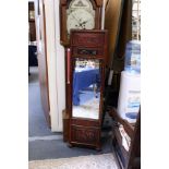 A Chinese dressing mirror with lacquer frame