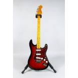 A Stratocaster electric guitar with FENDER neck. The body and hardware are probably SQUIER as the