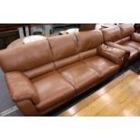 An Italian brown leather upholstered three seater settee